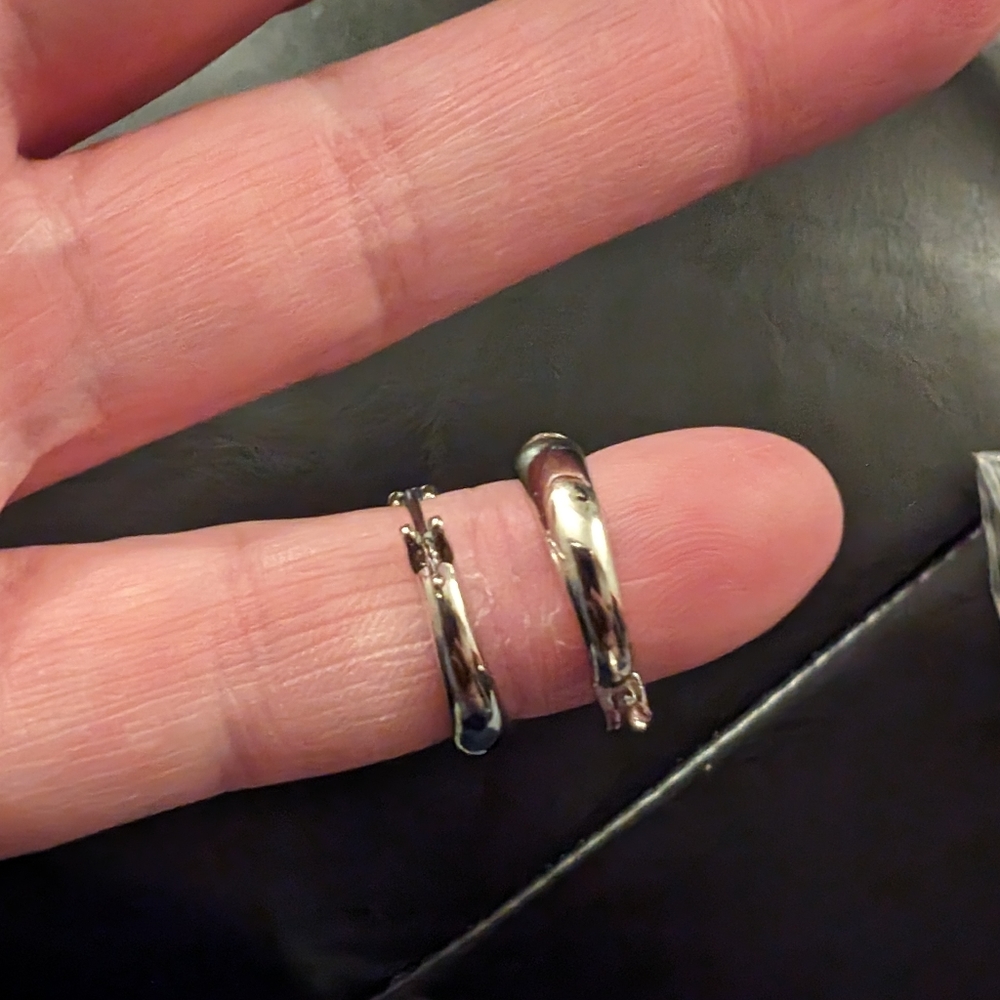 Raw diamond hoop clasp earrings in sterling silver.